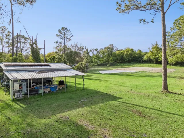 View of pole barn and middle of property.
