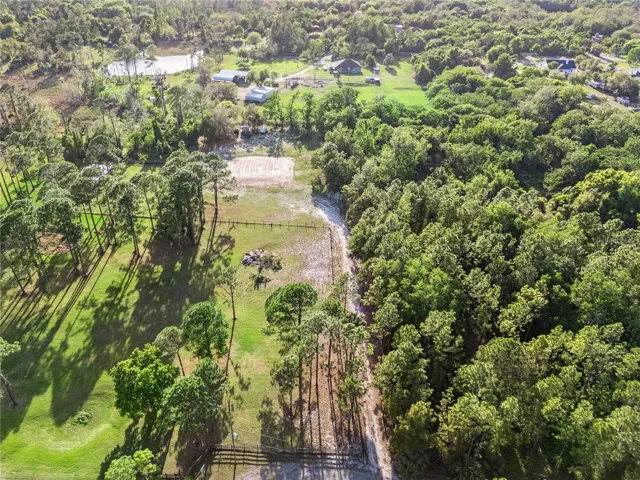 Bird's eye view of entrance to property from road/gate.