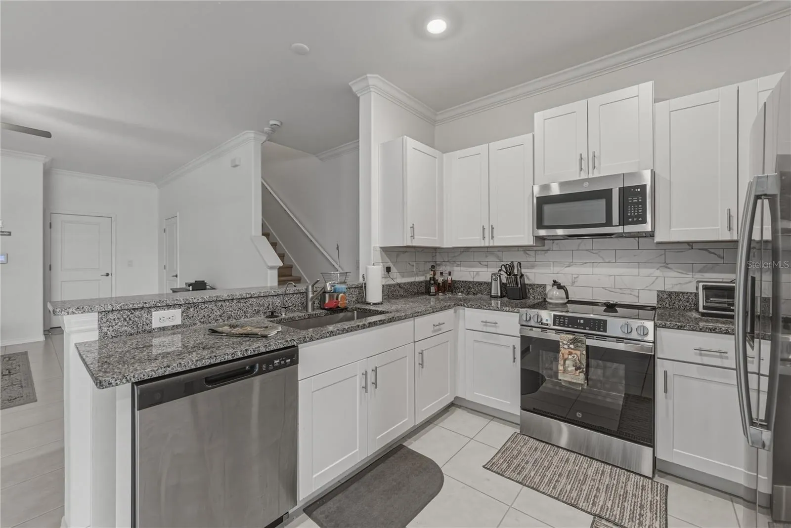 Kitchen with Full Overlay Shaker Cabinets, Nickel Hardware