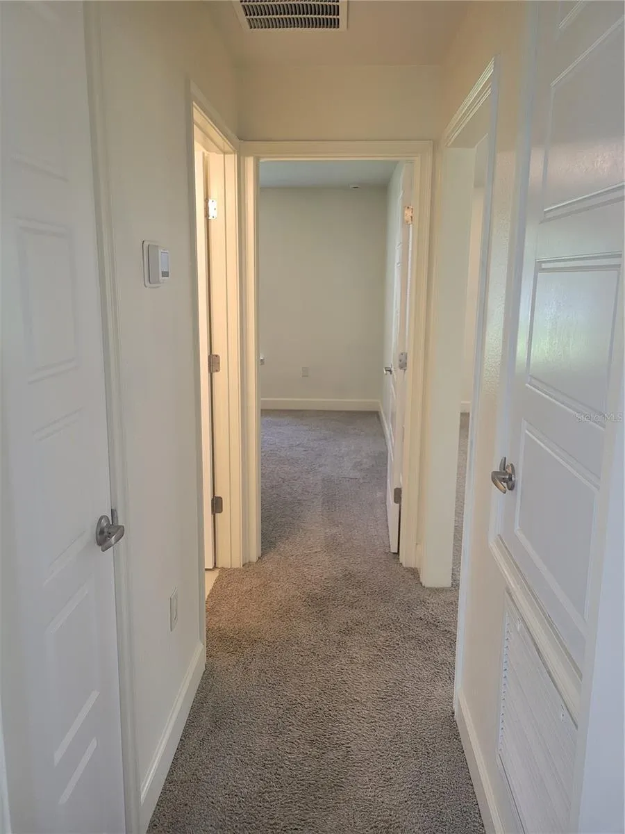 Hallway to bedrooms/bathroom