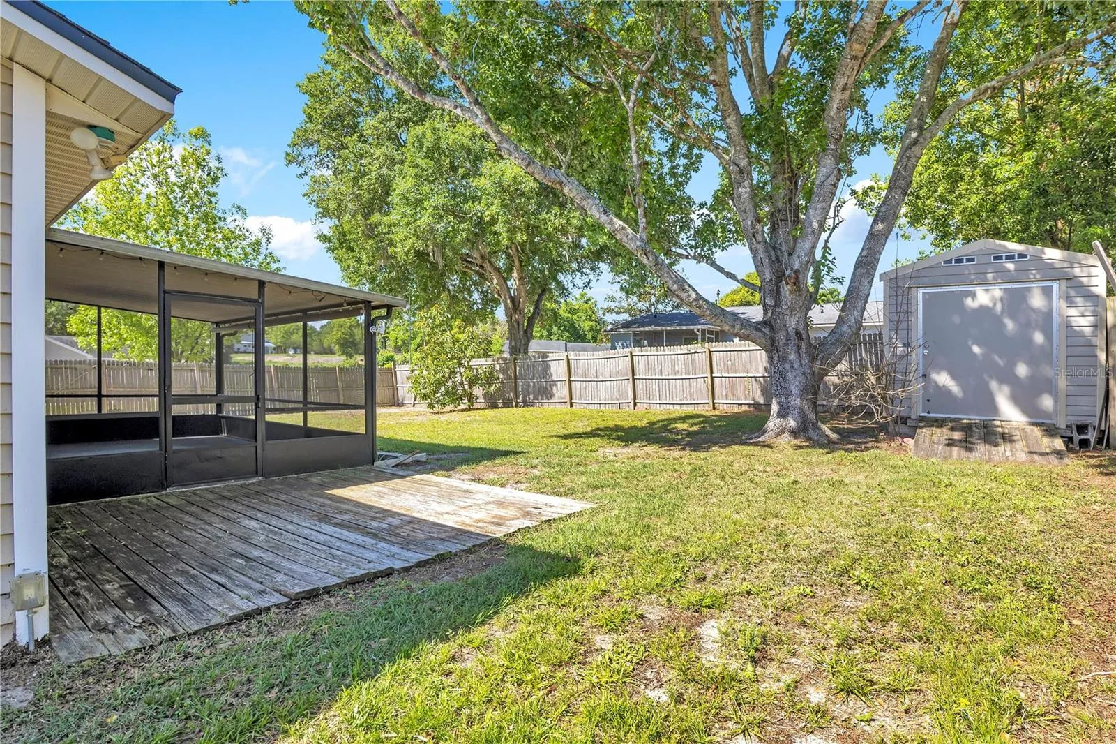 Fenced Backyard/Wood Patio/Shed