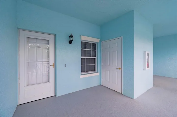 Front door to left. Storage closet to right.