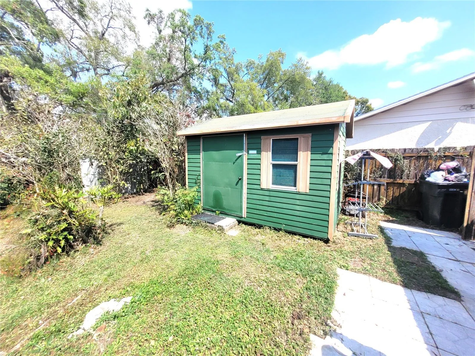 Backyard shed that has electricity running to it.