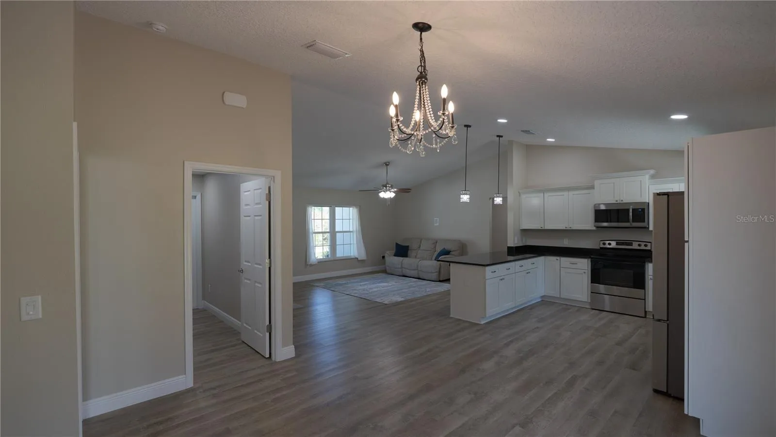 From Dining Room to Great Room and Kitchen
