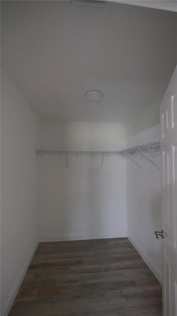 Primary Bedroom Walk In Closet