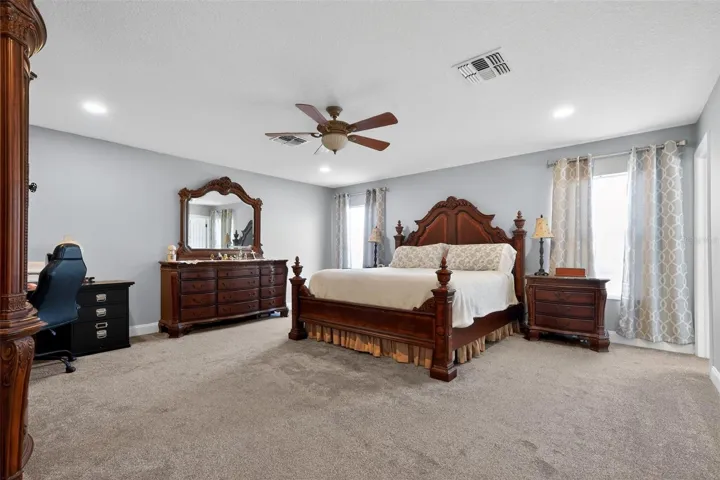 Primary Bedroom 17 x 17 with recessed lighting