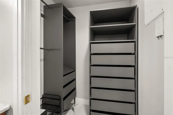 Custom storage in master closet.