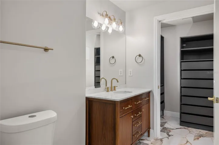 Fully updated Bathroom. Floors, Vanity, Shower, Lighting, Toilet, Closets, Paint Etc.