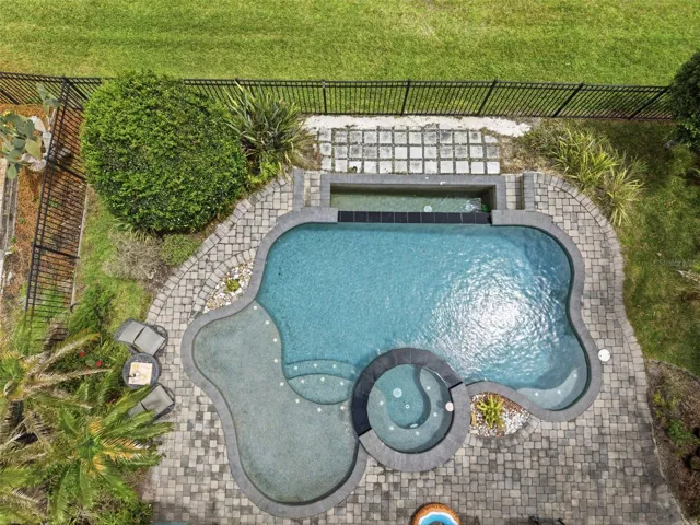 Overhead views of the infinity pool and spa