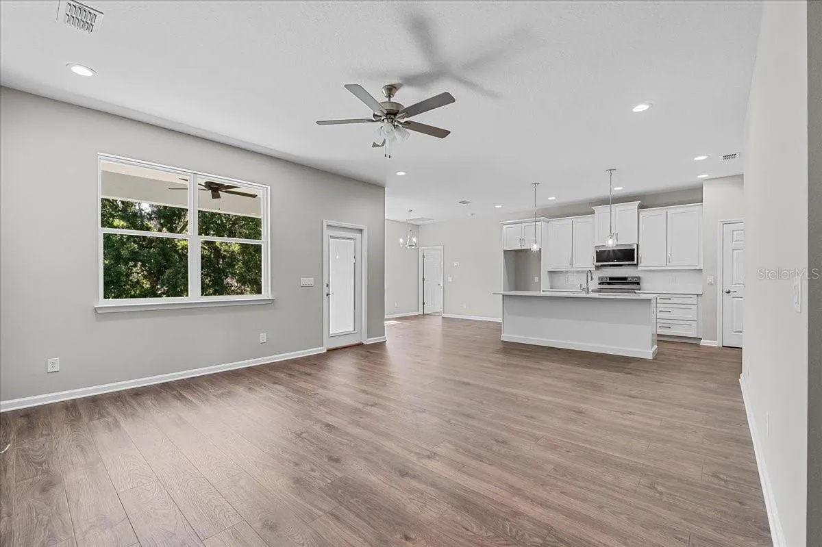 Great Room with Luxury Vinyl Plank Flooring