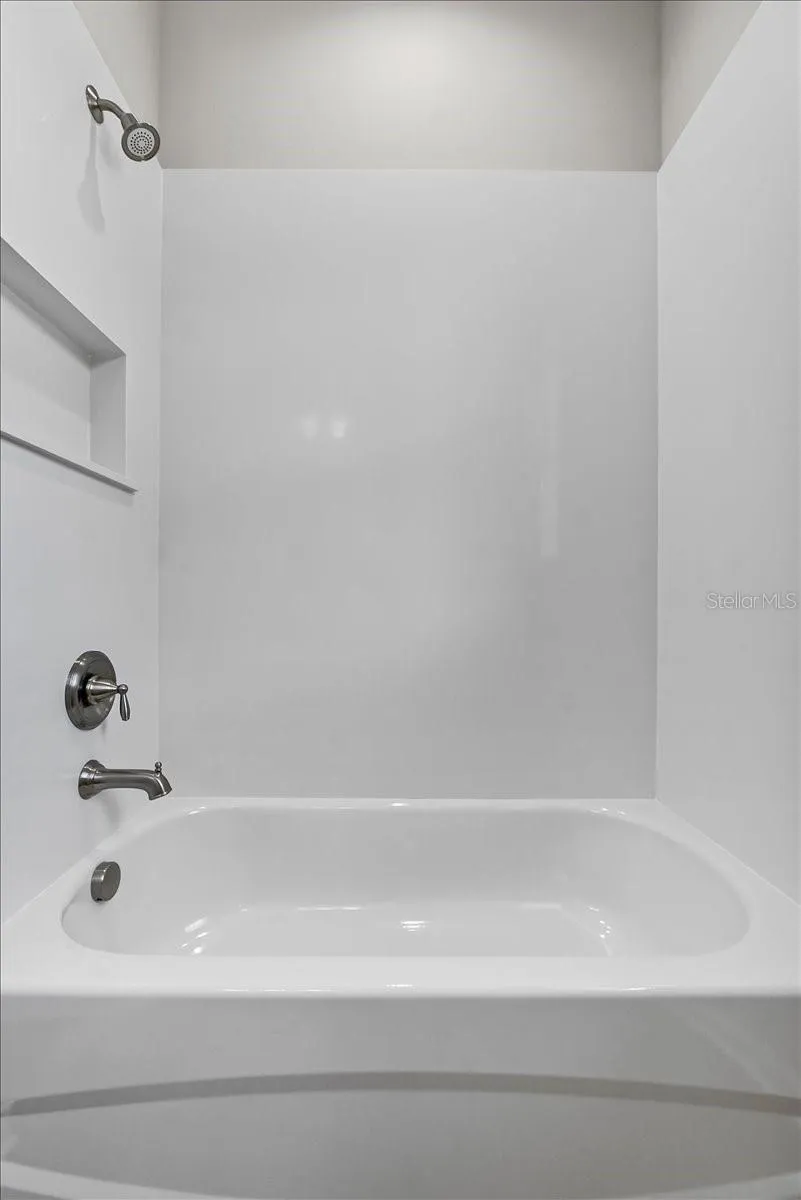 Hallway Bathroom with Luxury Quartzite Slab Shower