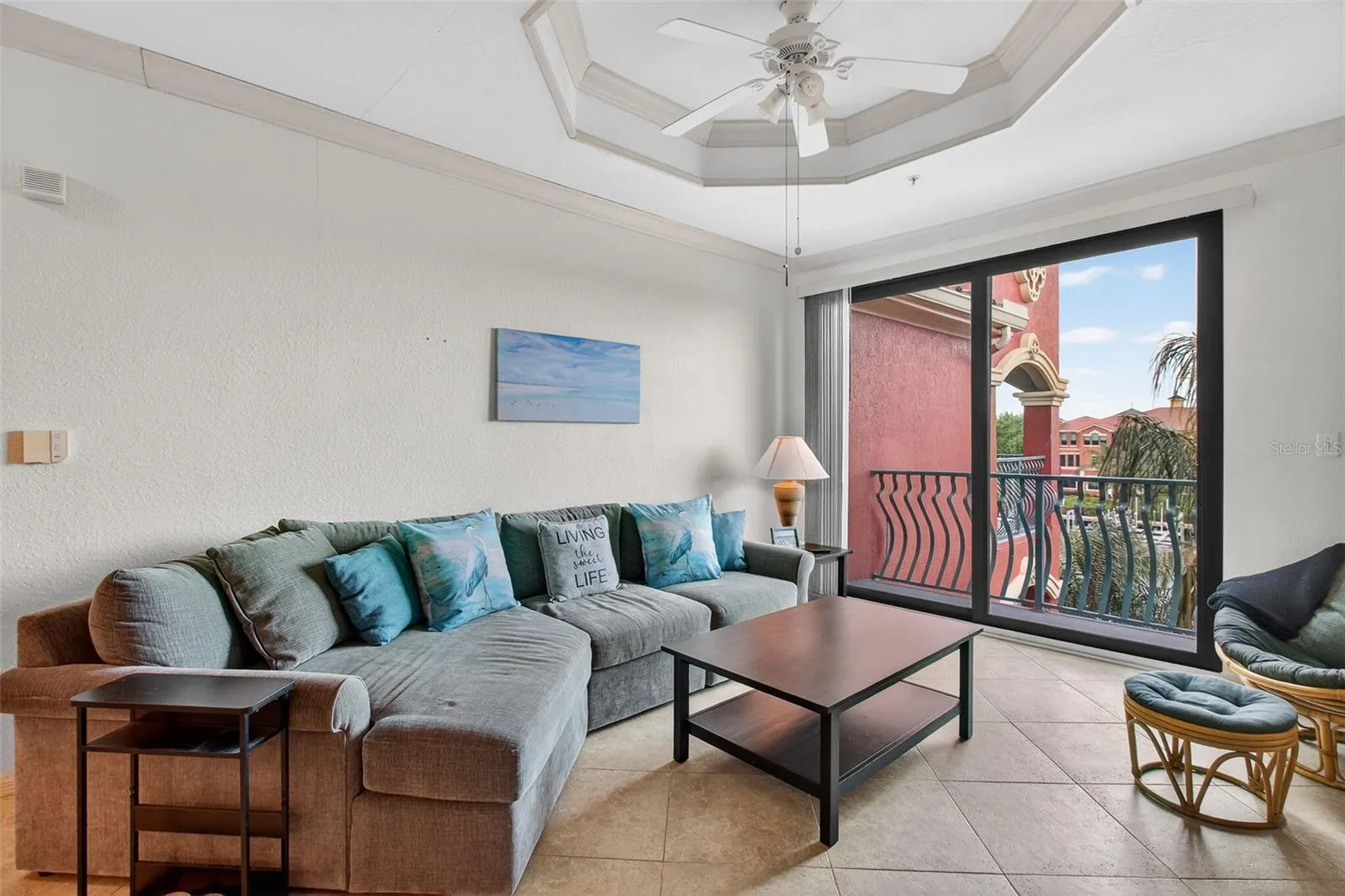 Living Room with waterfront balcony