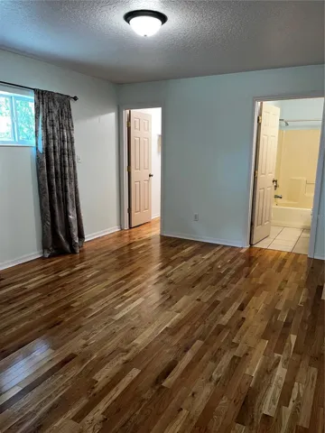 Primary Bedroom with walk-in closet and en-suite bathroom