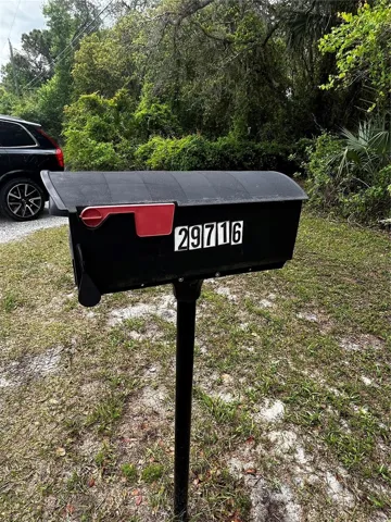 This is by the driveway leading to the house.