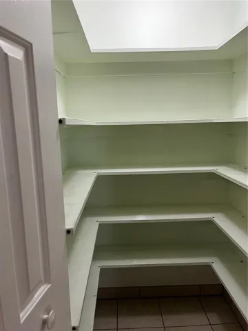 Closet on the right is the walk-in pantry in kitchen