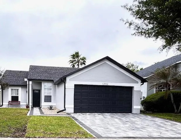 13932 Huntwick Drive 3 Bed 2 bath with Florida room, new extened paver driveway with matching front walk, freshly painted