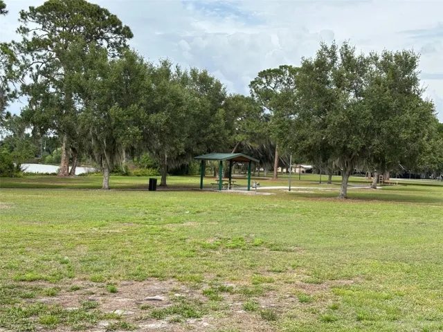 Lake and Covered Picnic Table at Park
