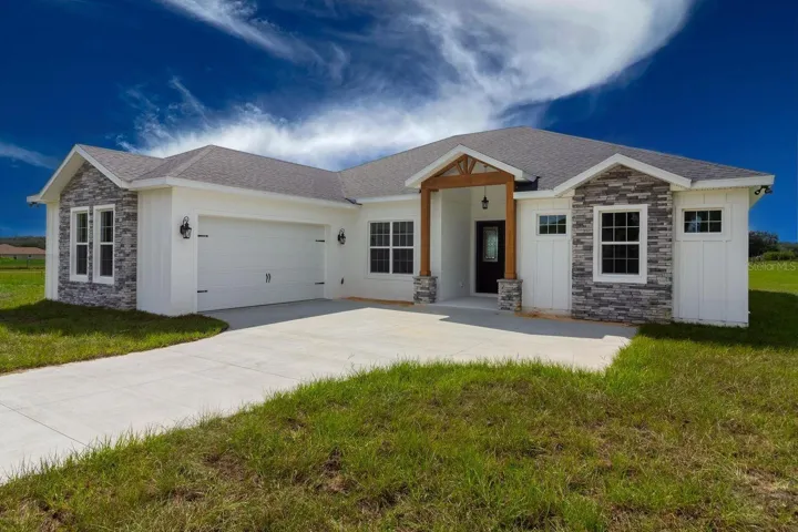The Willow Front Elevation - Photos are of a previously built home. Options selections may differ