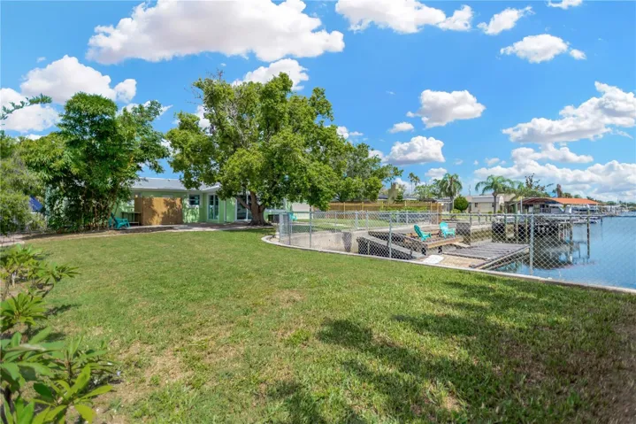 Fully fenced expansive backyard / sparkling water views.