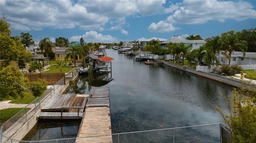 This home offers 110 feet of seawall with a 40 foot floating dock.  Upper stationary main dock rewooded in 2021.