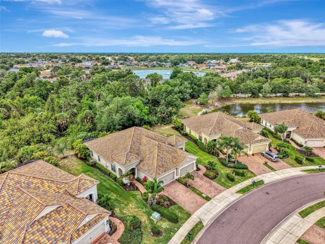 Villa with paver driveway, sidewalks, conservation tree view and minutes to Manasota Key beaches.