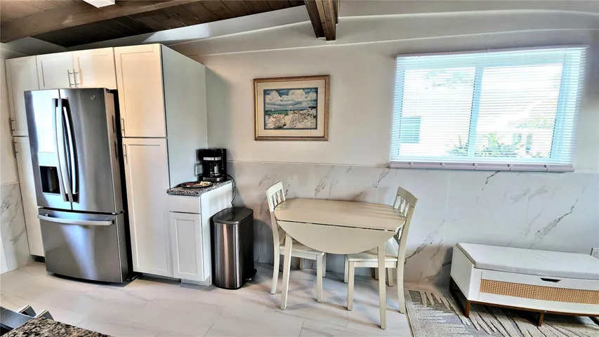 INSIDE EATING AREA. PLENTY OF CABINET SPACE