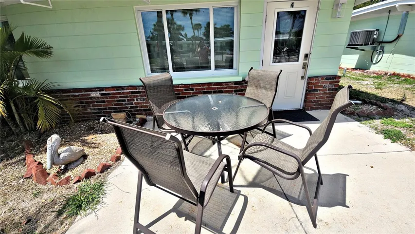 OUTDOOR PATIO SET AT YOUR POOL SIDE DOOR