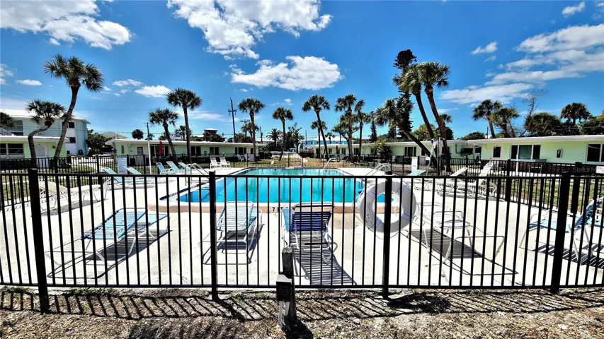 FENCED HEATED POOL WITH PLENTY OF SEATING