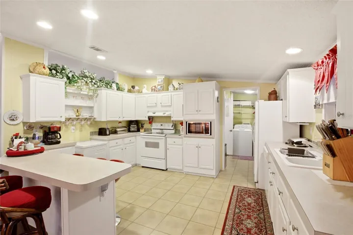 Kitchen with breakfast bar seating