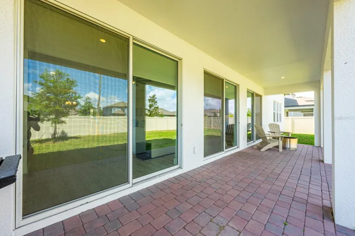 Covered paver lanai.