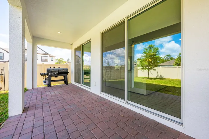 Covered paver lanai.
