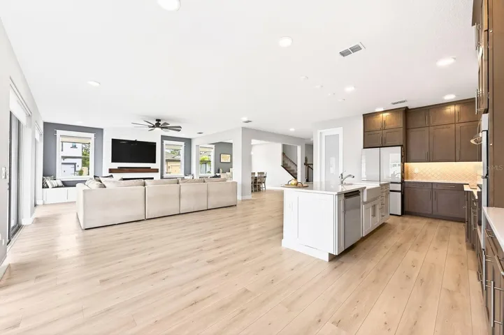 Kitchen is open to the living and dining areas.