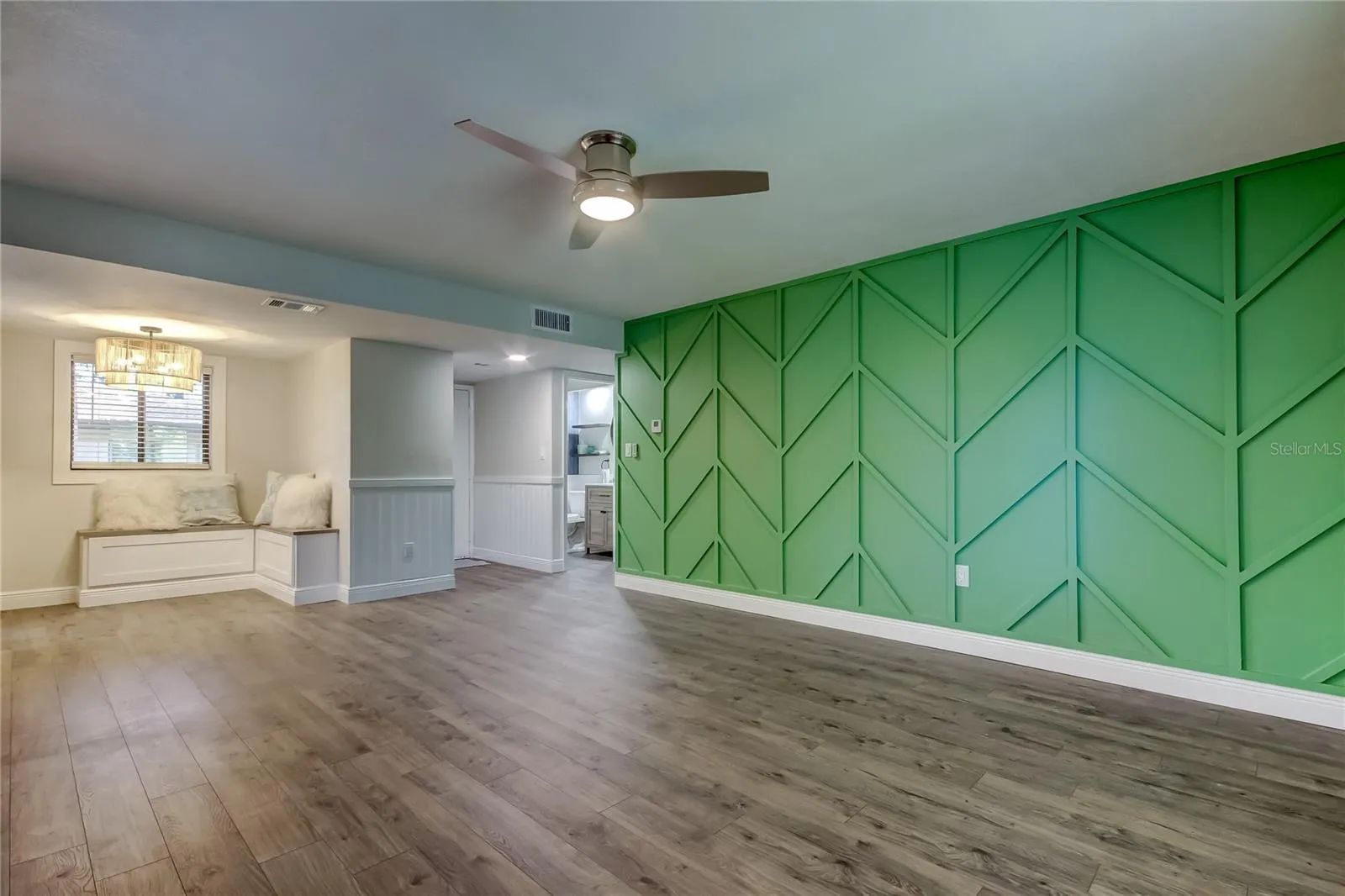 24. Custom Chevron Accent Wall in Living Room! (18.11x13.11)