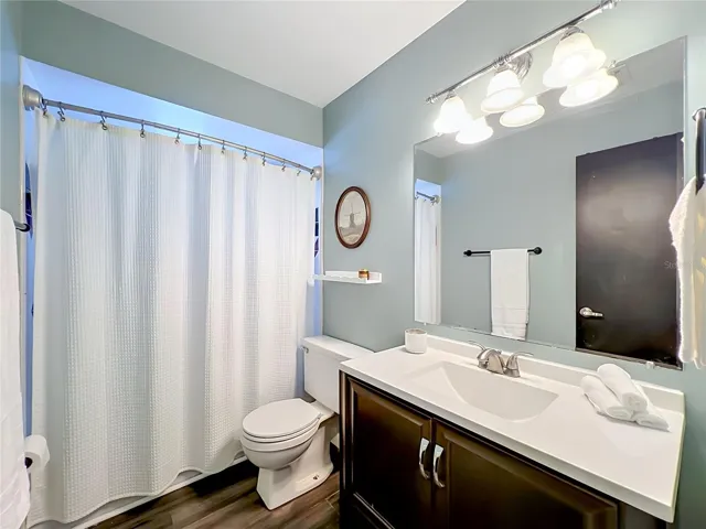 Bathroom 2. Stand in shower & Vanity off the hallway by Bed 2 & 3. Perfect for guest use