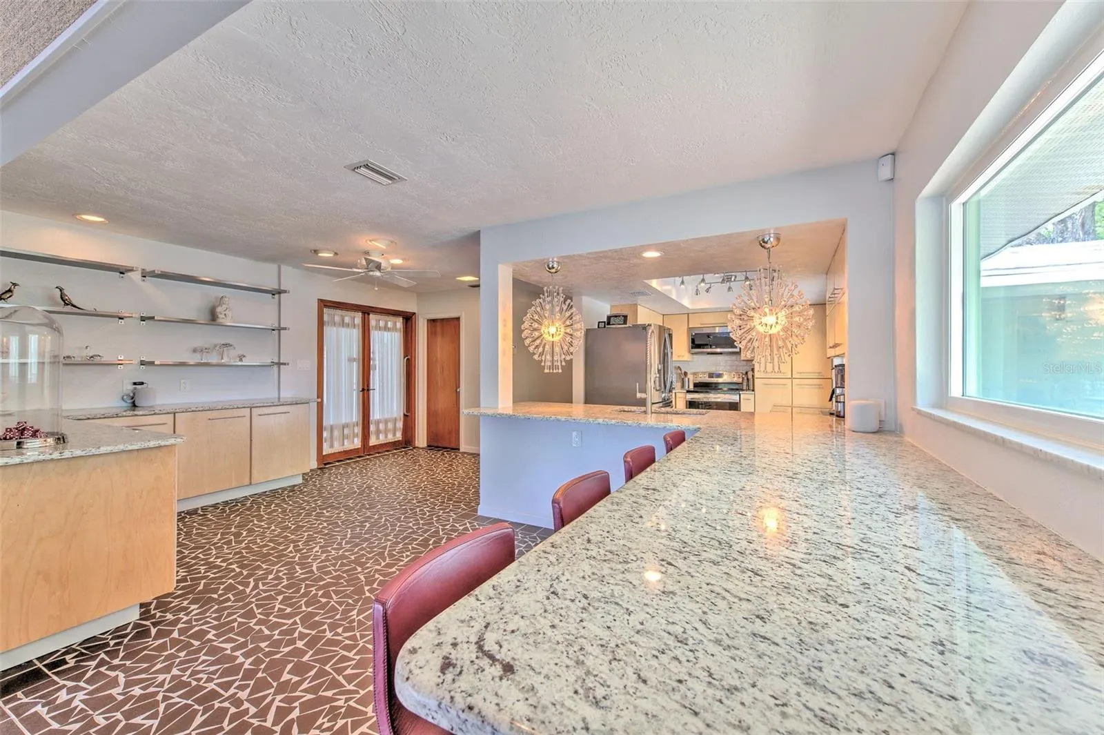 Huge kitchen, custom cabinetry, beautiful granite countertops , stainless steel appliances