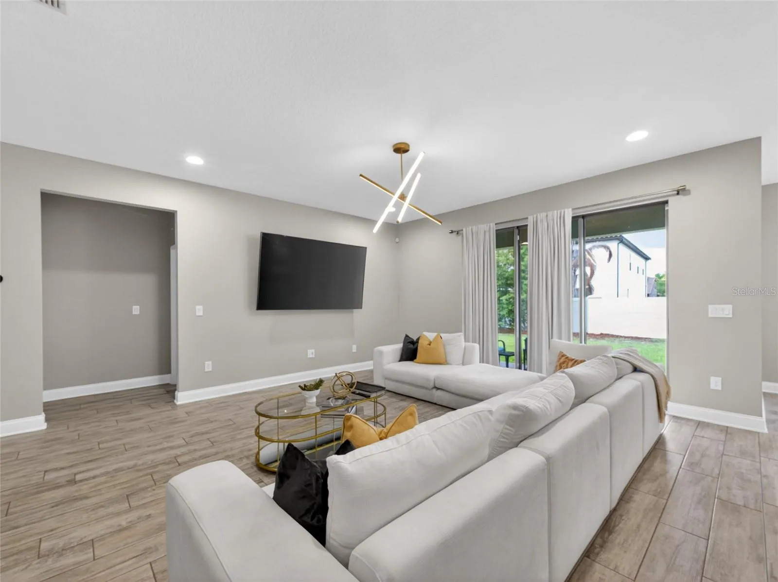 Great Room opens to the Lania and Back Yard