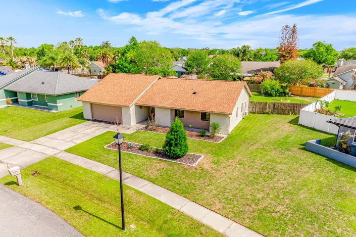 Welcome to the perfect balance of an updated, MOVE-IN READY HOME, and the relaxed lifestyle that makes the Wedgefield/Cape Orlando Estates community so desirable!