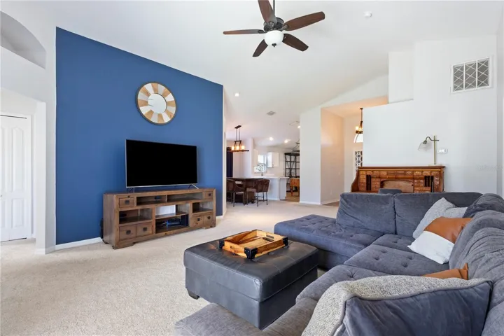 This highlighted wall accents the open concept living area.