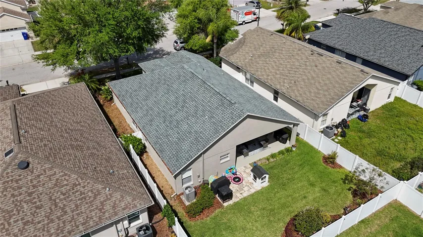 The extended paver patio features enough space for an outdoor grill and seating!