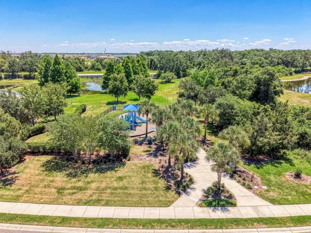 Beautiful playground with mature trees, sidewalks and shade. River's Reach. Parrish, FL.