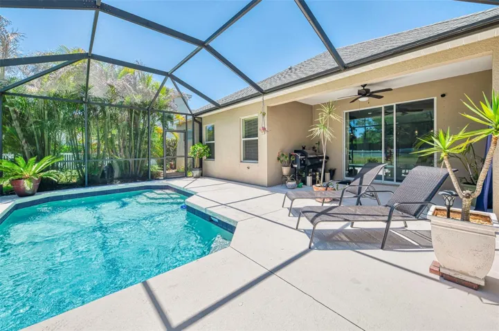 Sparkling pool. Covered and screened lanai for outdoor entertaining.