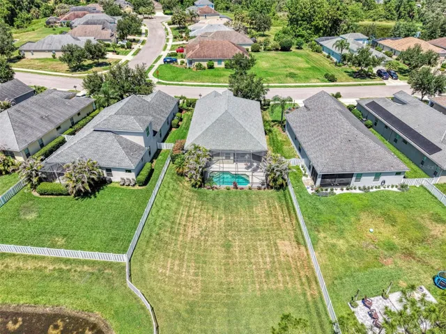 3 Bed, 2 Bath, POOL Home for Sale in River's Reach, Parrish FL with large oversized Fully Fenced Backyard.