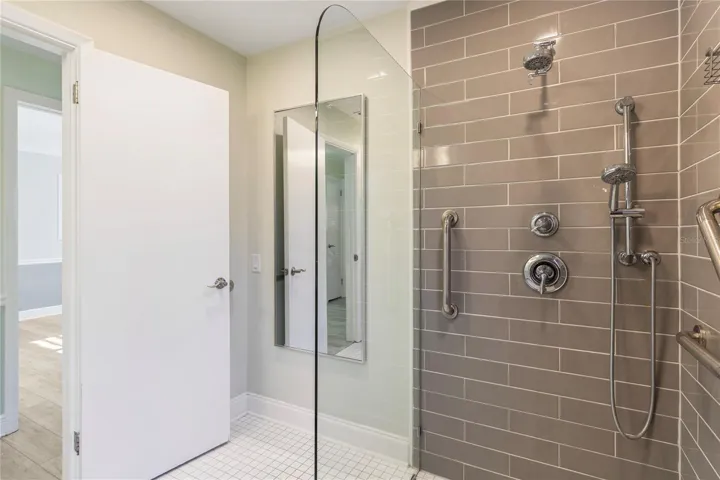 2nd Bath  has new glass partition separating it from teh sink a lav area.