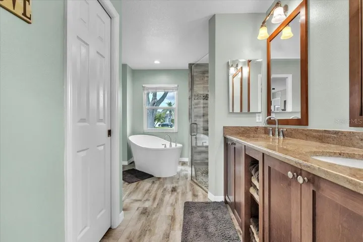 Upgraded Master Bath with tub and granite counters