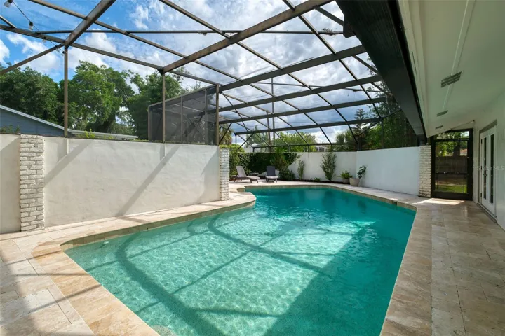 Screened solar-heated pool