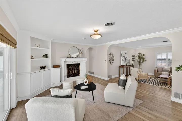 Family room with wood burning fireplace