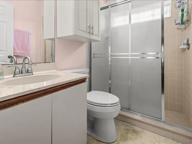 MAIN BATHROOM HAS NEW FAUCET. WALK-IN SHOWER IS TILED.