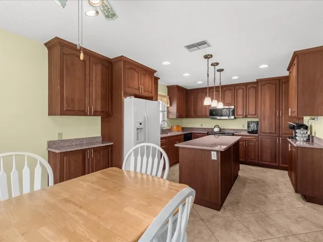VIEW OF THE KITCHEN FROM THE DINING AREA.