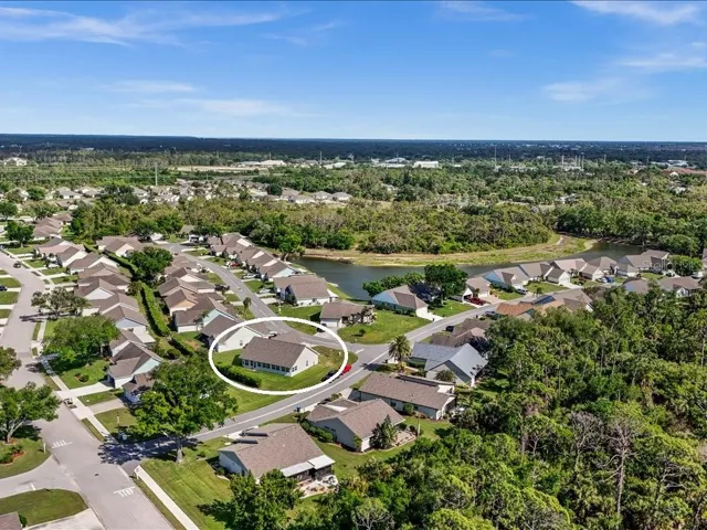 AERIAL VIEW OF THE PROPERTY TOWARDS THE SOUTH.