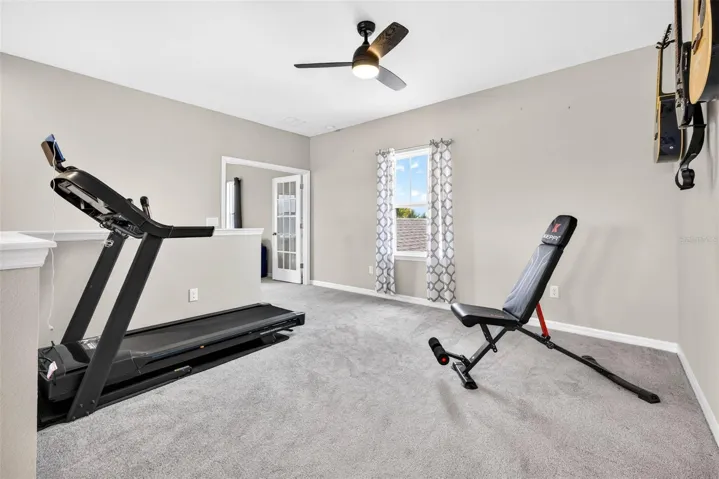 Loft currently being used as a workout space